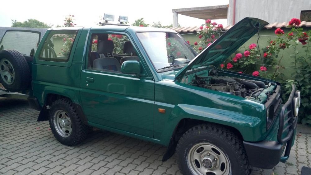 155030533_1_1000x700_daihatsu-feroza-16-benzina-1991-timisoara_rev002.thumb.jpg.78946a9ae785f07eb4b3e1b21947b328.jpg